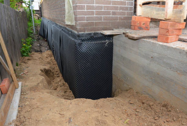Happy homeowners after waterproofing job in Rockbridge